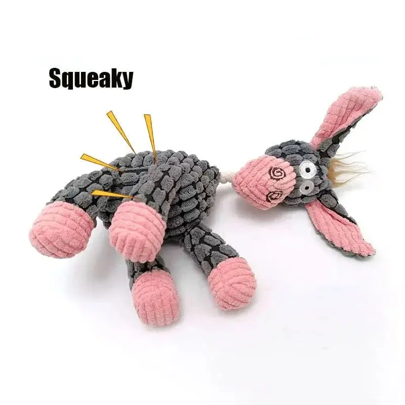 Dog with plush toy